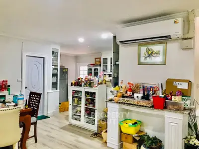 Charming kitchen with open layout and modern appliances in cozy home