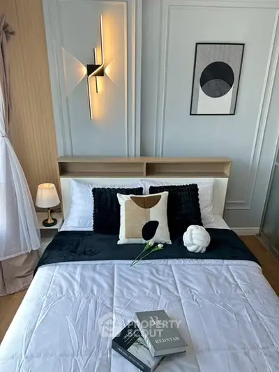 Stylish modern bedroom with elegant decor and cozy bedding