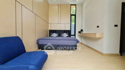 Modern minimalist bedroom with sleek design and natural light
