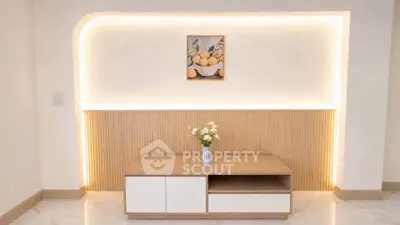 Modern minimalist living room with elegant lighting and stylish decor