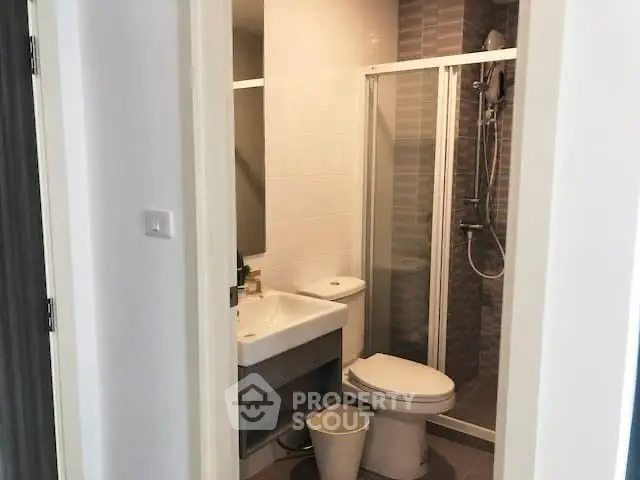 Modern bathroom with sleek shower and contemporary fixtures