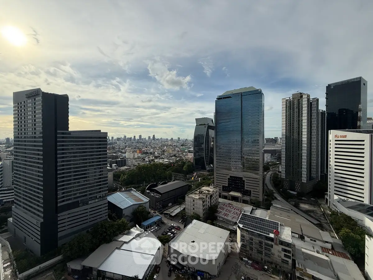 Stunning cityscape view showcasing modern skyscrapers and urban landscape under a clear sky.