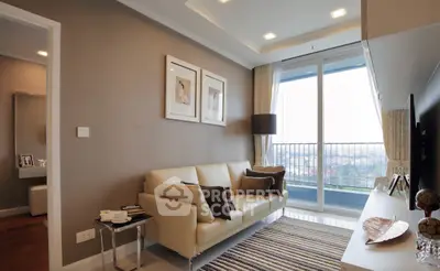 Modern living room with cozy sofa and large window offering stunning city view.
