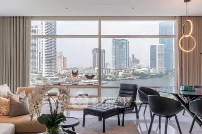 Luxurious living room with stunning city and river view, modern furniture, and elegant decor.