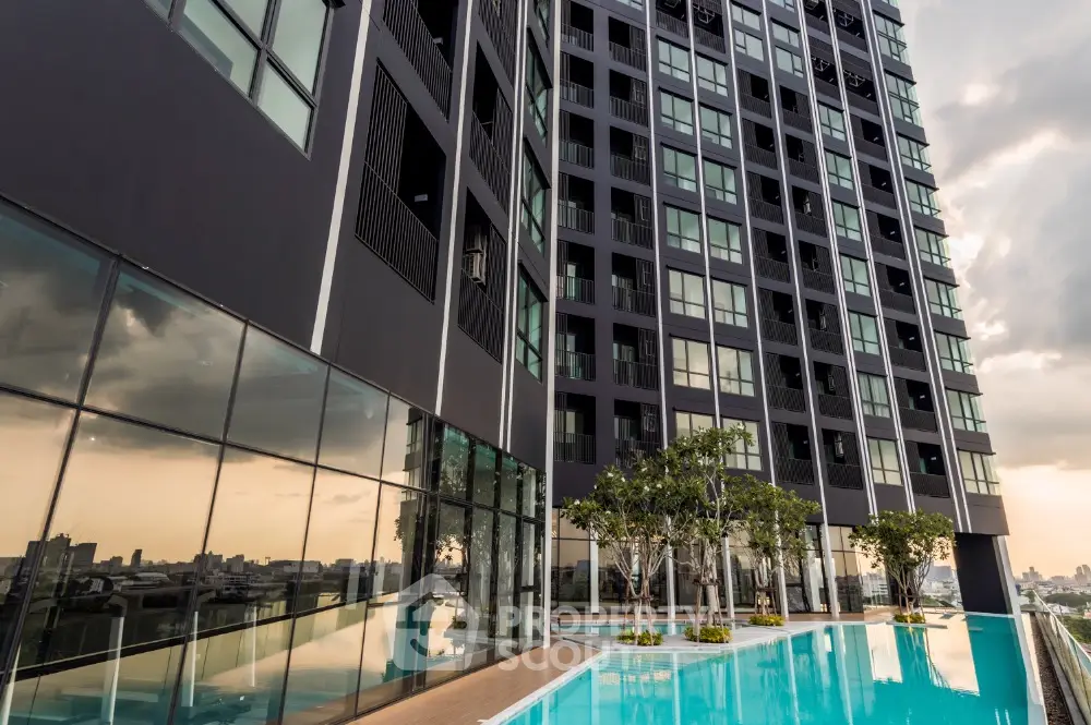 Luxurious high-rise building with stunning pool and city view