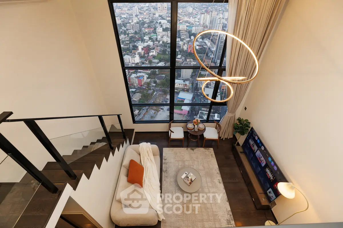 Luxurious high-rise living room with stunning city view and modern decor