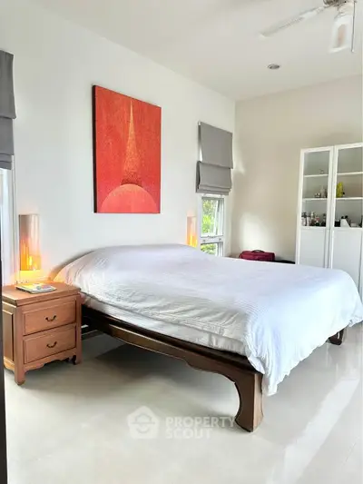 Bright and airy bedroom with modern decor and natural light
