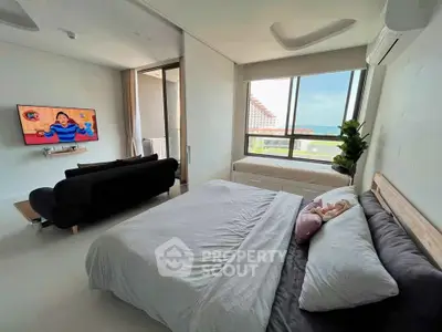 Modern bedroom with ocean view and stylish decor