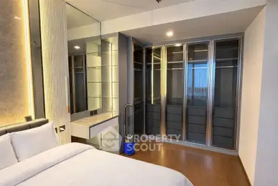 Luxurious bedroom with modern design and spacious walk-in closet