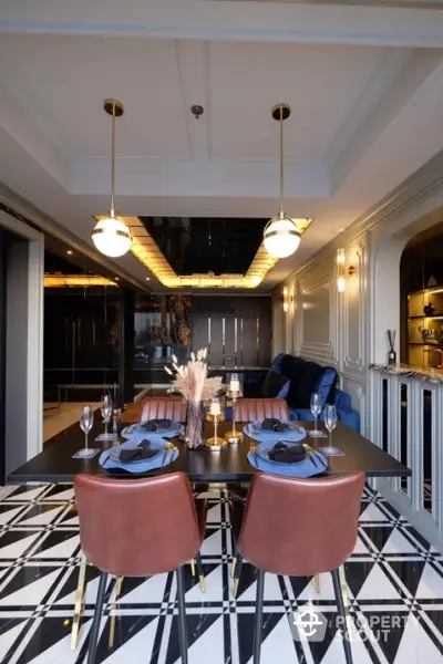 Luxurious dining area with elegant decor and modern lighting in upscale apartment