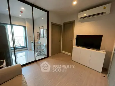Modern living room with air conditioning and balcony view