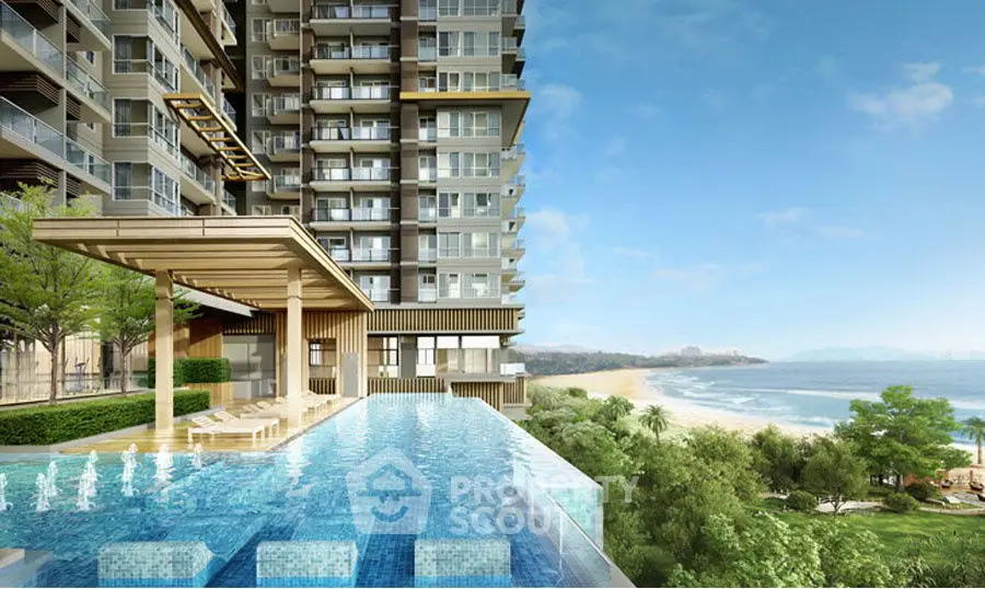 Luxurious beachfront apartment with stunning infinity pool and ocean view.