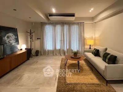 Elegant living room with modern decor and cozy ambiance