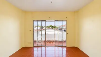 Spacious room with large windows offering a stunning view, perfect for natural light lovers.