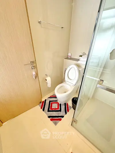 Modern bathroom with glass shower and stylish decor
