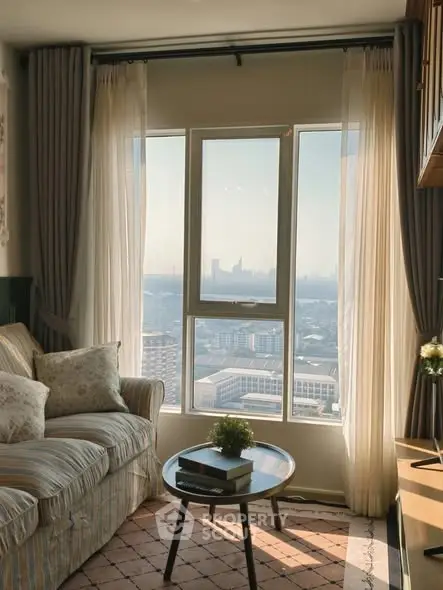Cozy living room with panoramic city view through large windows, elegant curtains, and stylish furniture.