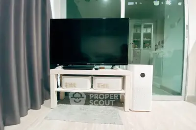 Modern living room with sleek TV setup and stylish decor