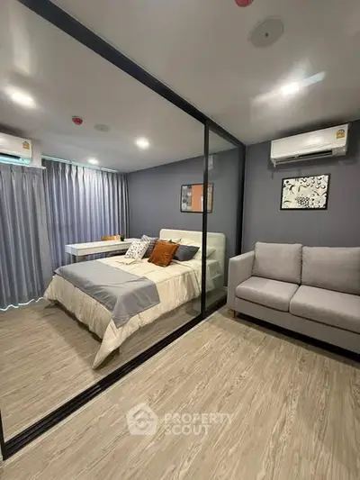 Modern bedroom with glass partition and cozy decor