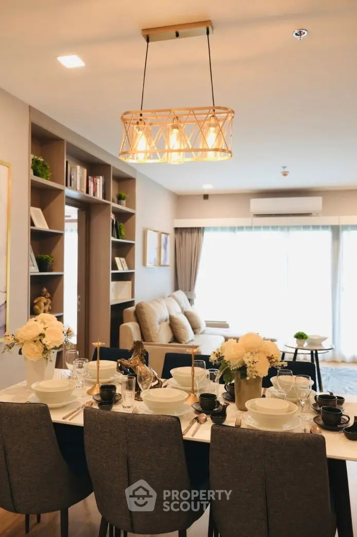 Elegant living and dining area with modern decor and cozy ambiance