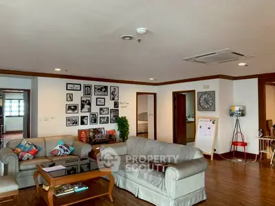 Spacious living room with elegant decor and cozy seating area