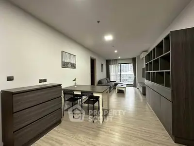 Spacious modern living room with sleek furniture and open layout