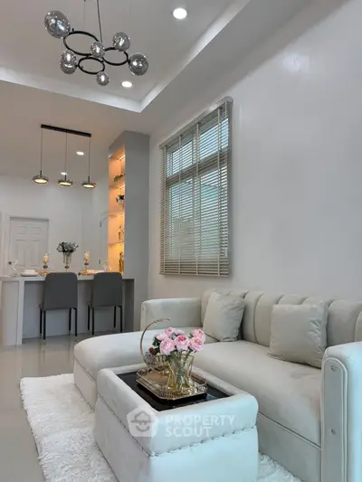 Elegant living room with modern decor and cozy seating area