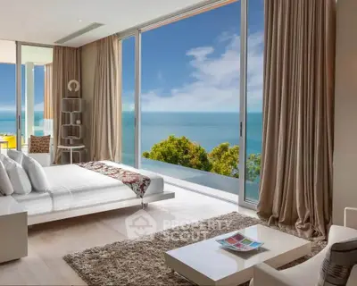 Luxurious bedroom with stunning ocean view and modern decor