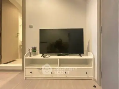 Modern living room with sleek TV setup and elegant decor