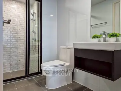 Modern bathroom with sleek design and glass shower enclosure