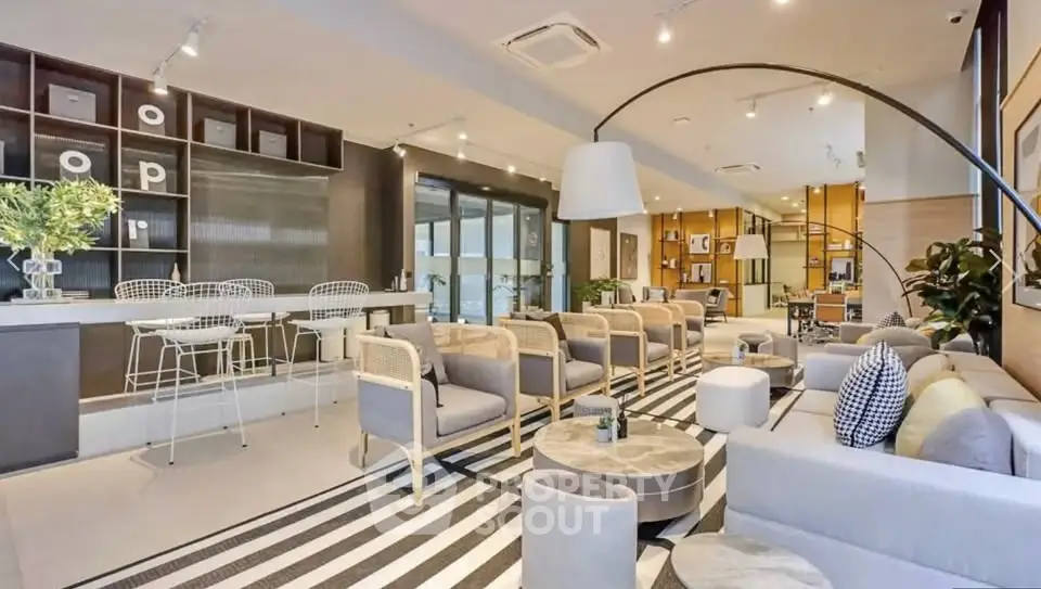 Spacious modern living room with stylish furniture and open layout, perfect for entertaining.