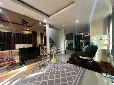 Spacious modern living room with stylish decor and natural light