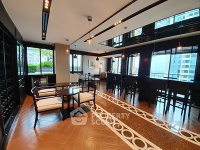 Luxurious modern living room with elegant decor and stunning city views, perfect for entertaining guests.