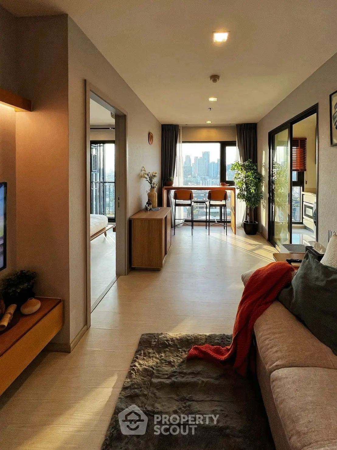 Modern living room with city view and stylish decor