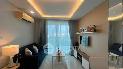 Modern living room with stylish decor and large window view