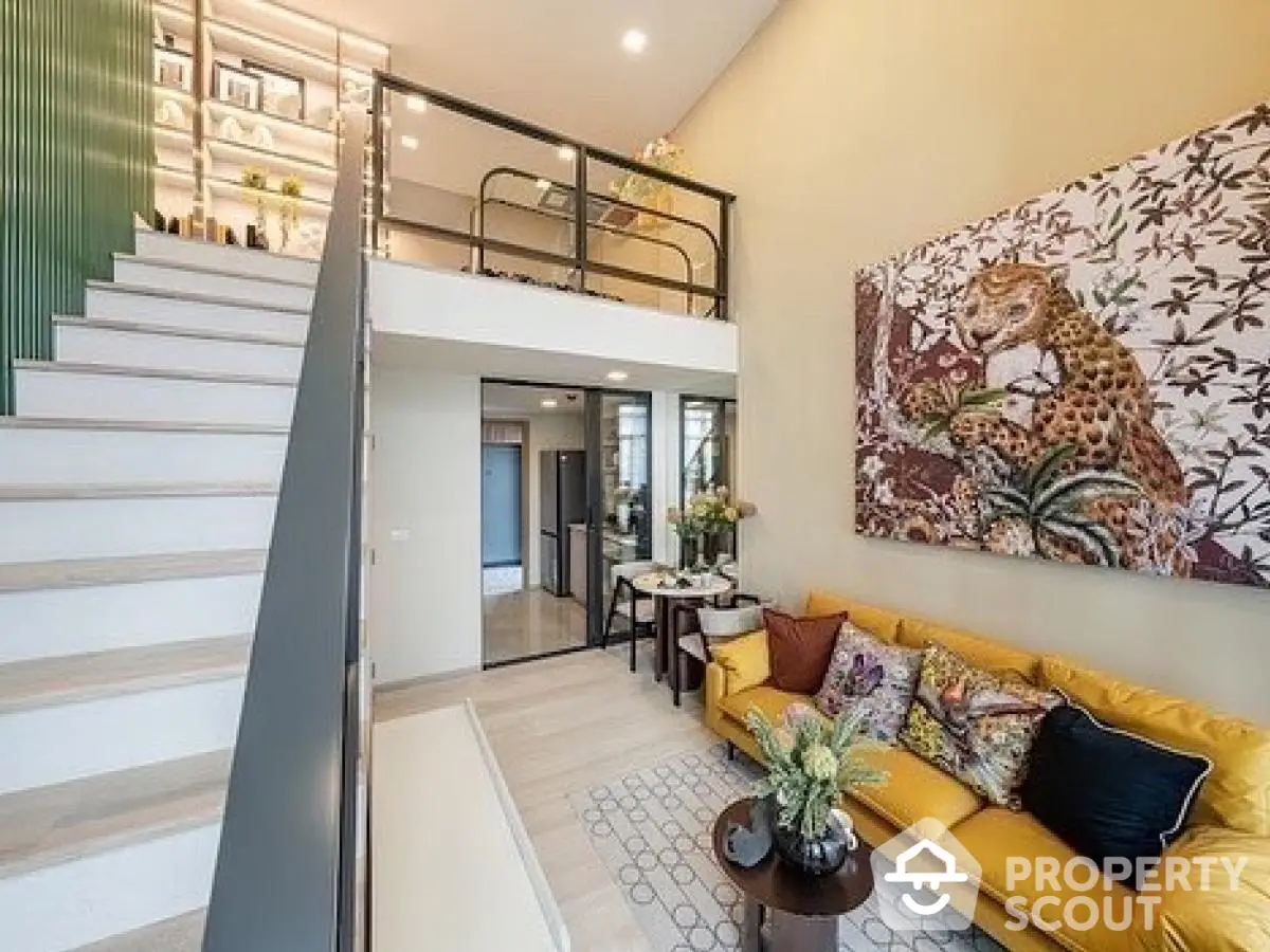 Modern duplex living room with vibrant decor and mezzanine level