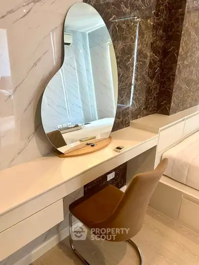 Elegant bedroom with modern vanity and unique mirror design