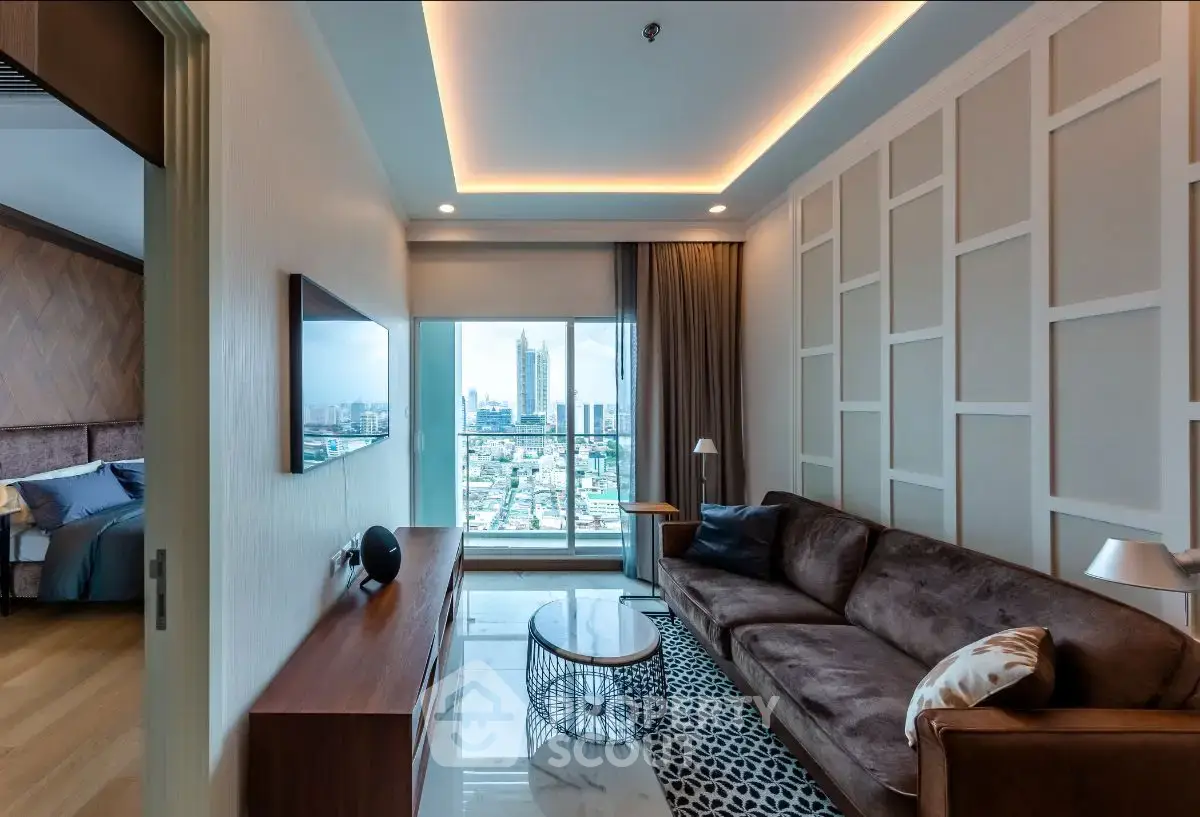 Luxurious living room with modern decor and stunning city view from large windows.