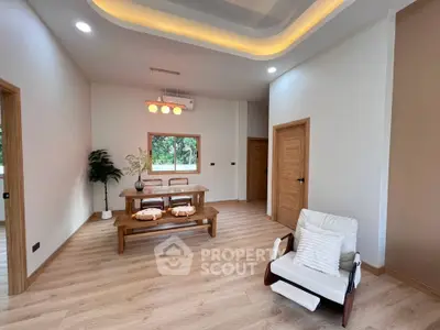 Spacious modern living room with elegant wooden furniture and ambient lighting