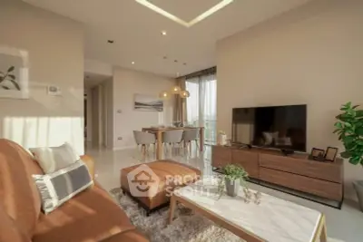 Spacious modern living room with elegant decor and natural light
