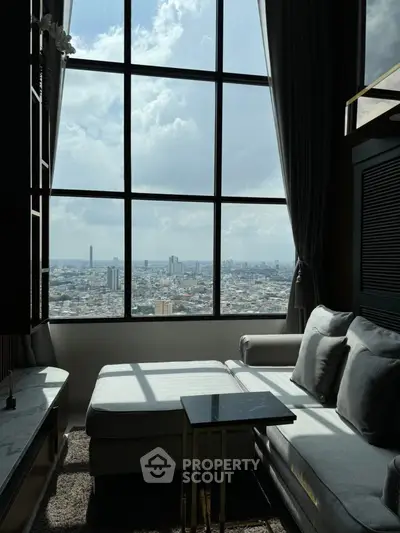 Luxurious living room with panoramic city view and elegant furnishings