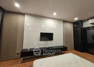 Modern living room with sleek TV setup and stylish decor