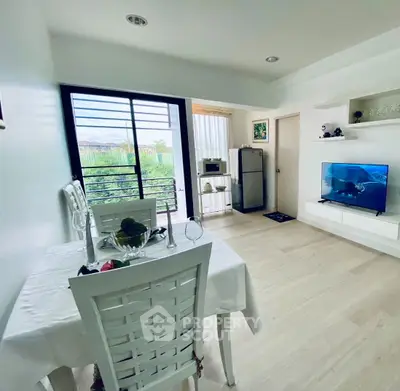 Charming open-layout living room with dining area and modern decor