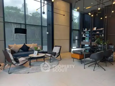 Luxurious modern living room with high ceilings and stylish furniture in a contemporary apartment.