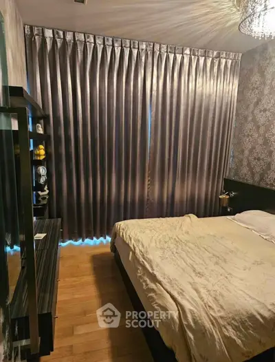 Cozy bedroom with elegant curtains and stylish decor