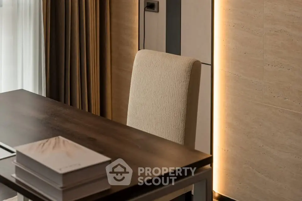 Elegant study room with modern desk and ambient lighting, perfect for productivity and style.