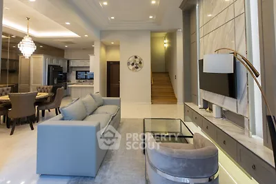 Luxurious modern living room with elegant decor and open kitchen layout