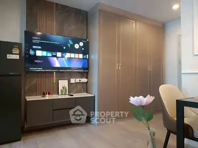 Modern living room with sleek TV unit and elegant cabinetry