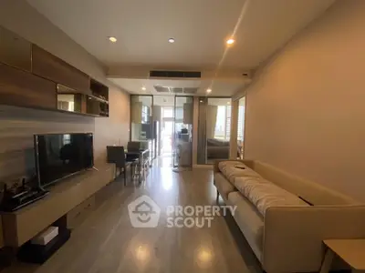 Spacious modern living room with sleek furniture and natural light