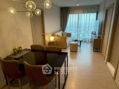 Modern living room with elegant dining area and city view