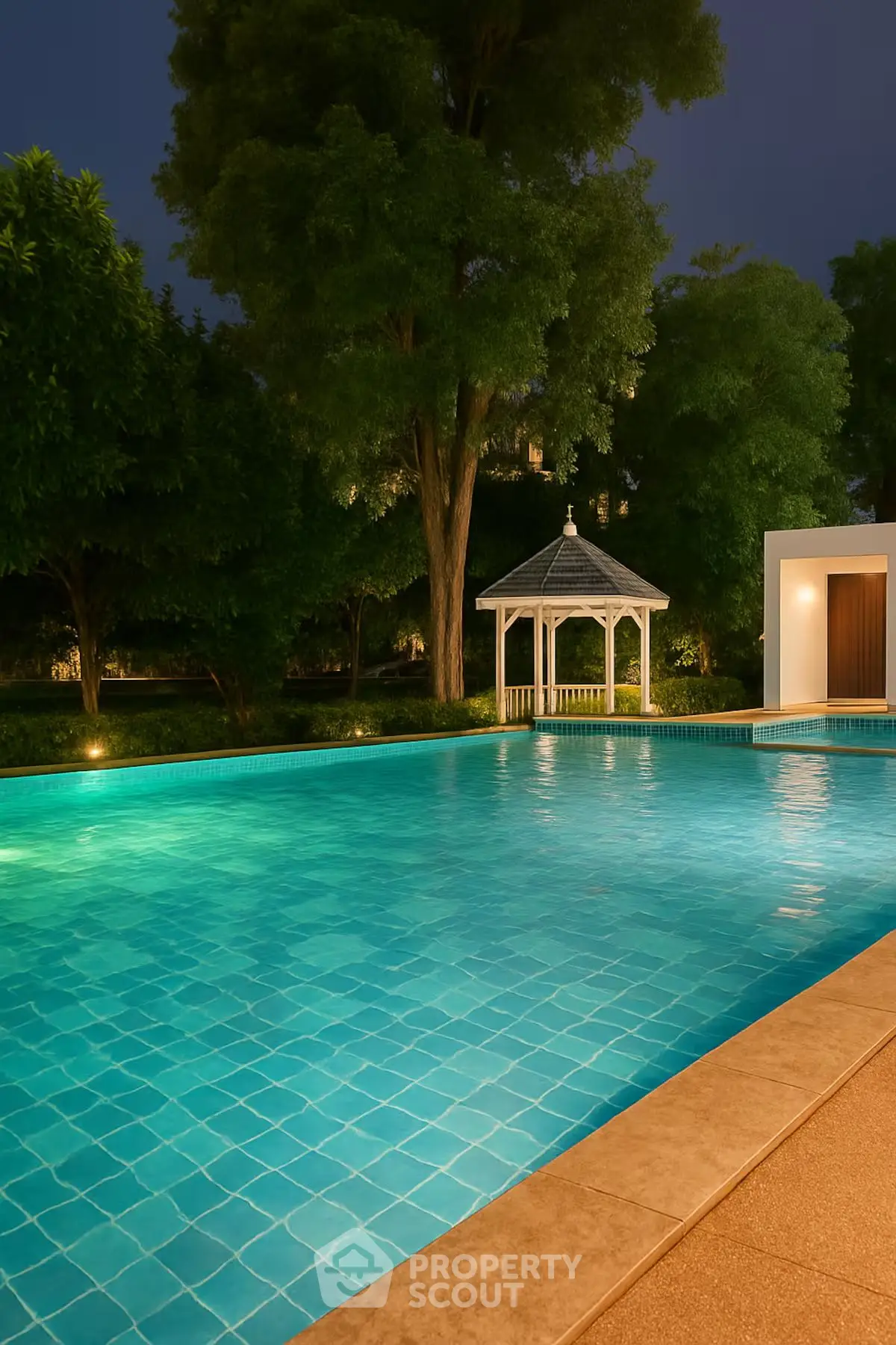Luxurious outdoor pool area with gazebo and lush greenery, perfect for relaxation and entertainment.
